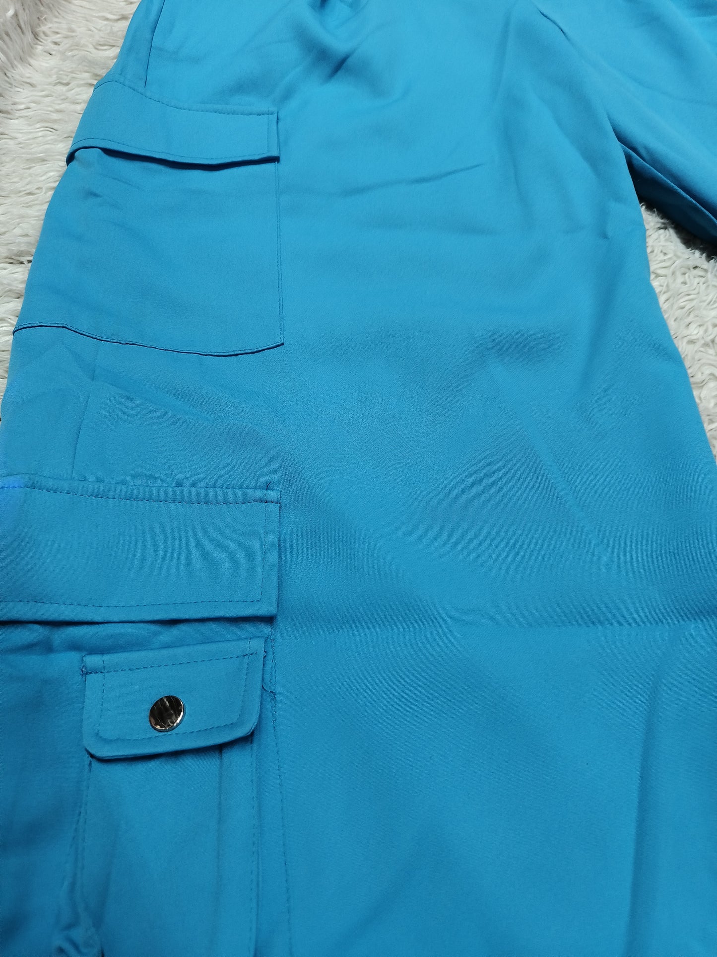 Cargo pants with side pockets and silver buttons