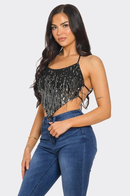 SEQUIN TOP WITH FRINGES AT THE OPEN BACK.