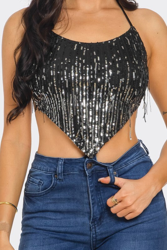 SEQUIN TOP WITH FRINGES AT THE OPEN BACK.
