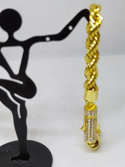 Gold bracelet with silver stone