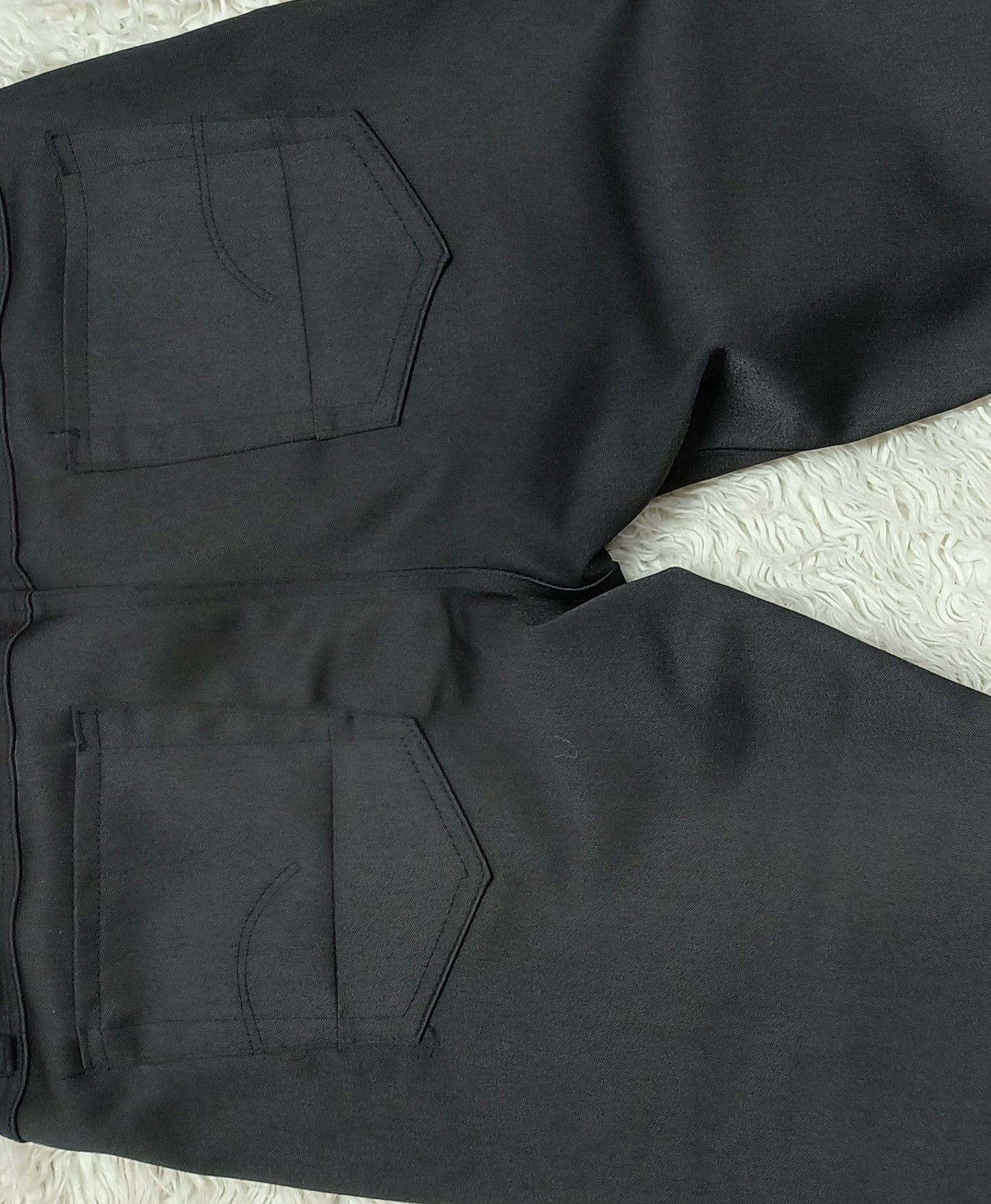 Solid black trousers